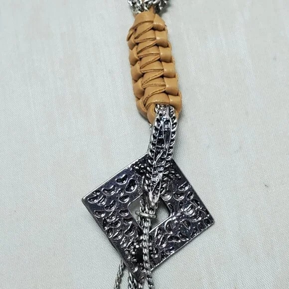 BKE tan leather with silver chain braided neck with hanging charms 27 inch NWT