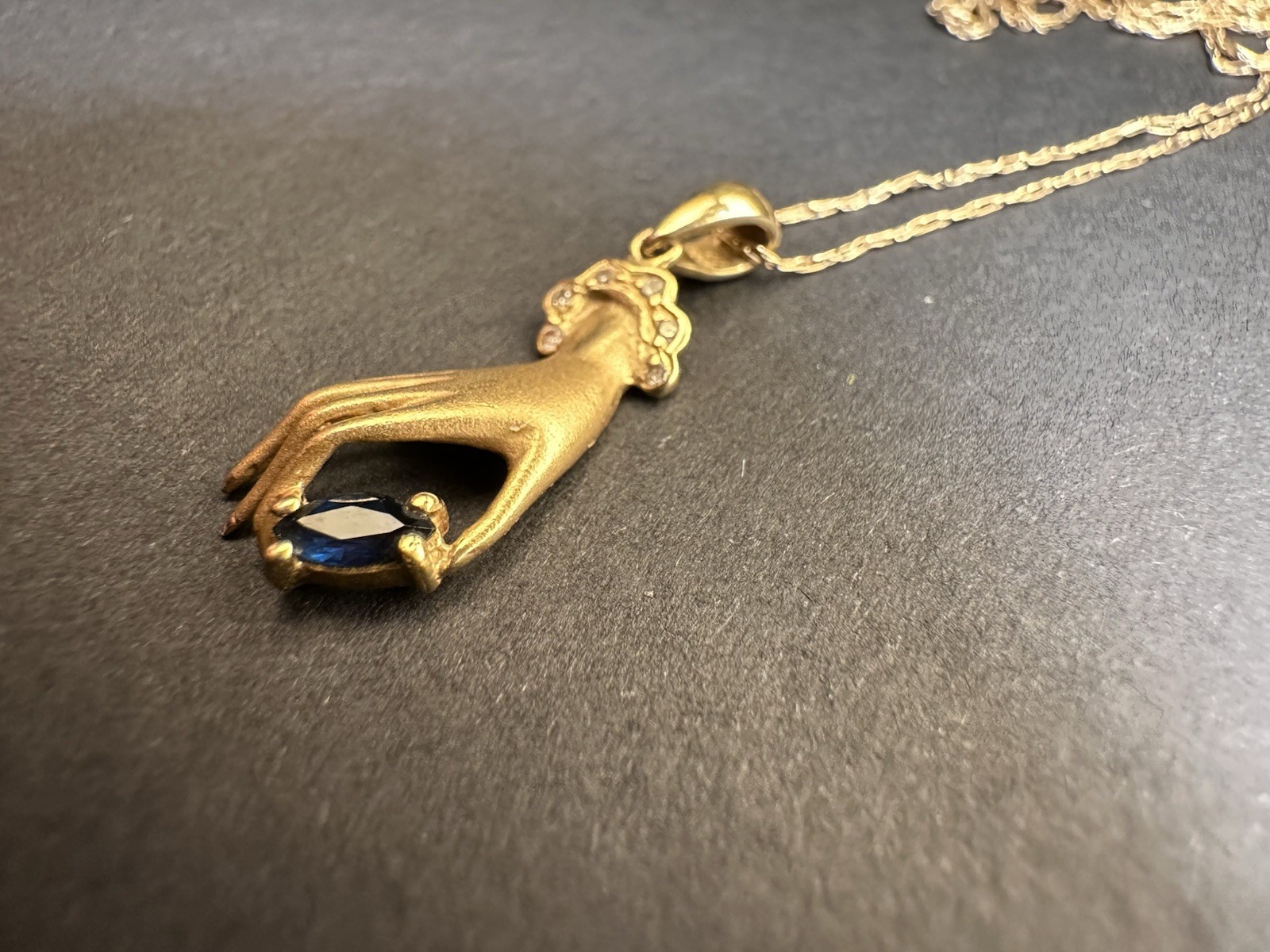 Vintage 18k Gold Hand Charm Pendant Necklace Marquise cut Sapphire and Diamonds