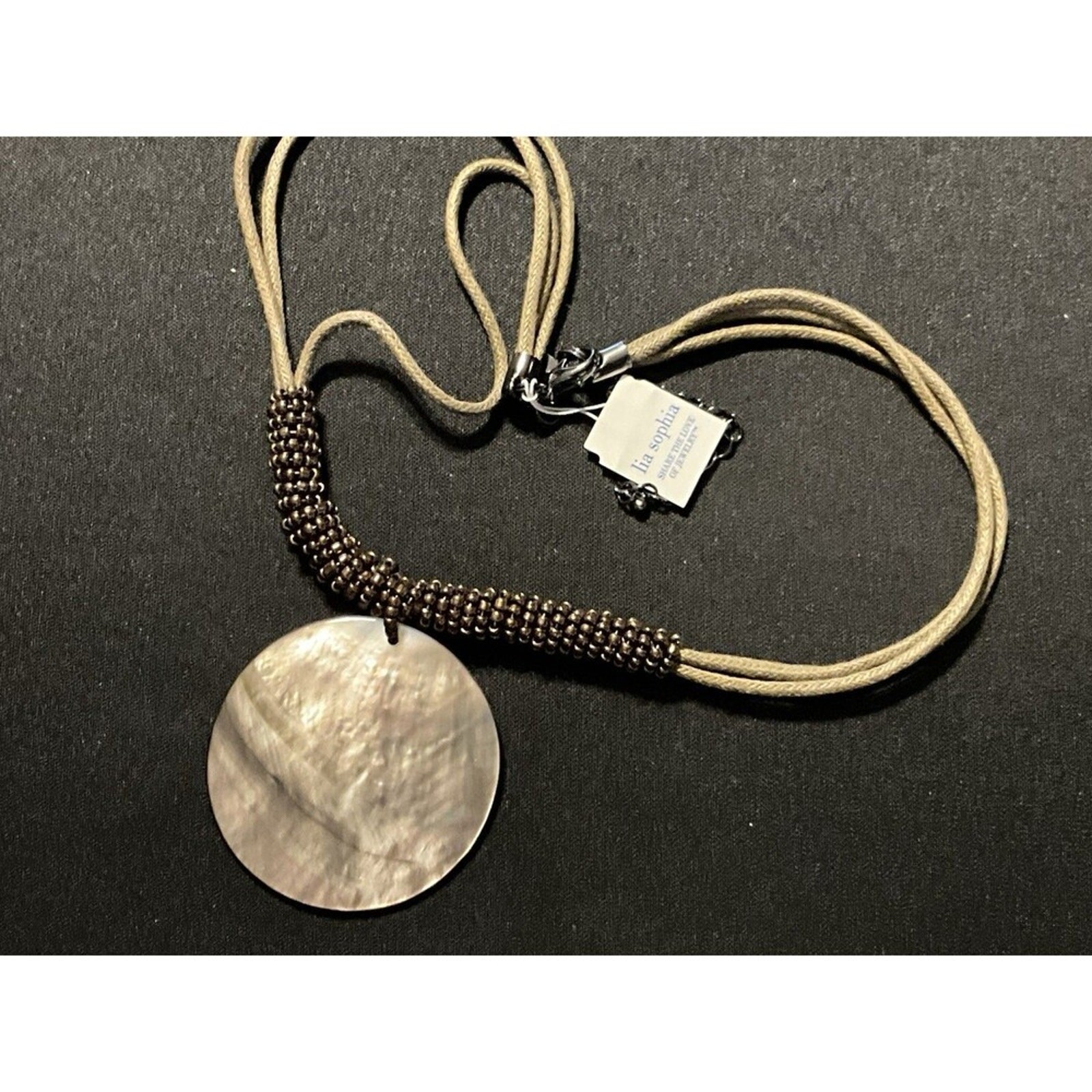 Lea Sophia Rope Necklace W/ Albalone Shell Pendant.