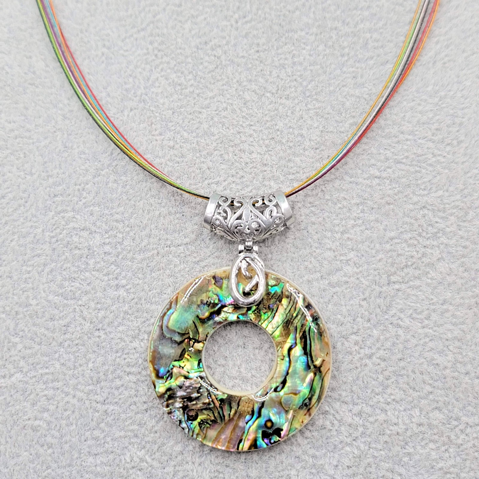 Abalone Shell Ring Pendant Silver tone Necklace Multi Color Cord 18 in