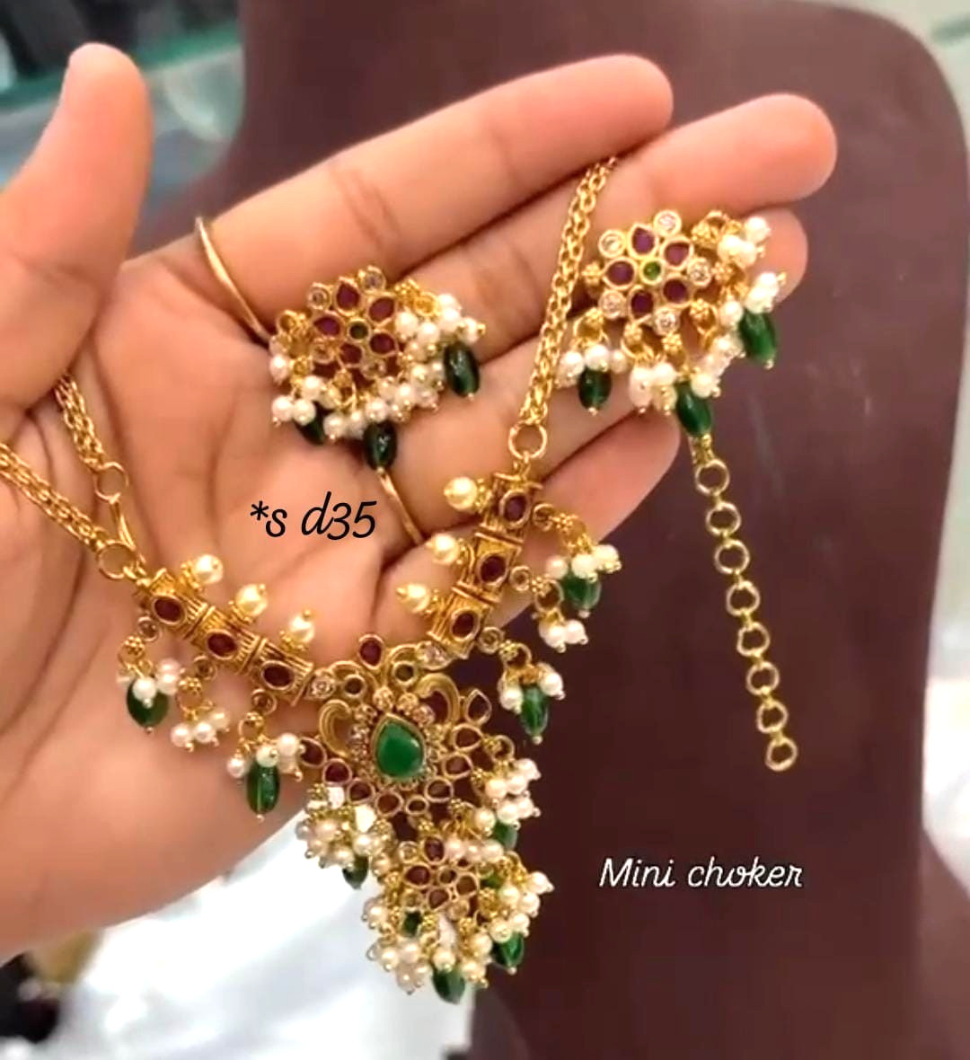Gold-plated guttapusalu choker set ruby emerald and white stone with pearl drops