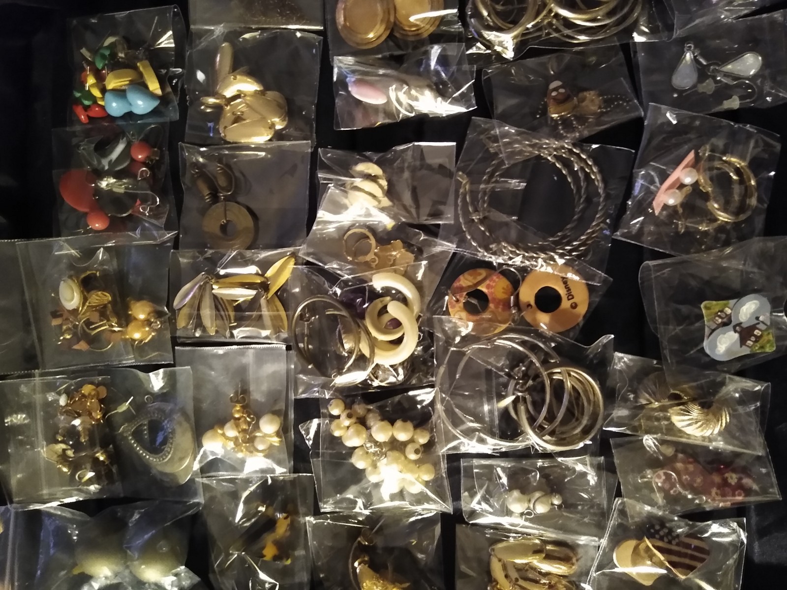 50+ Huge lot pierced earrings Many styles, shapes, sizes, colors. Bagged (L323)