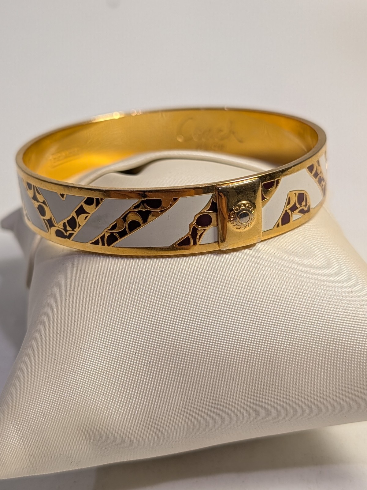Coach gold-tone enamel bangle bracelet White And Black Zebra Print