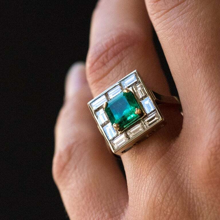 Claw Set Square 1.62CT Emerald Surrounded By Ten Baguette Cut 1.96CT CZ Ring