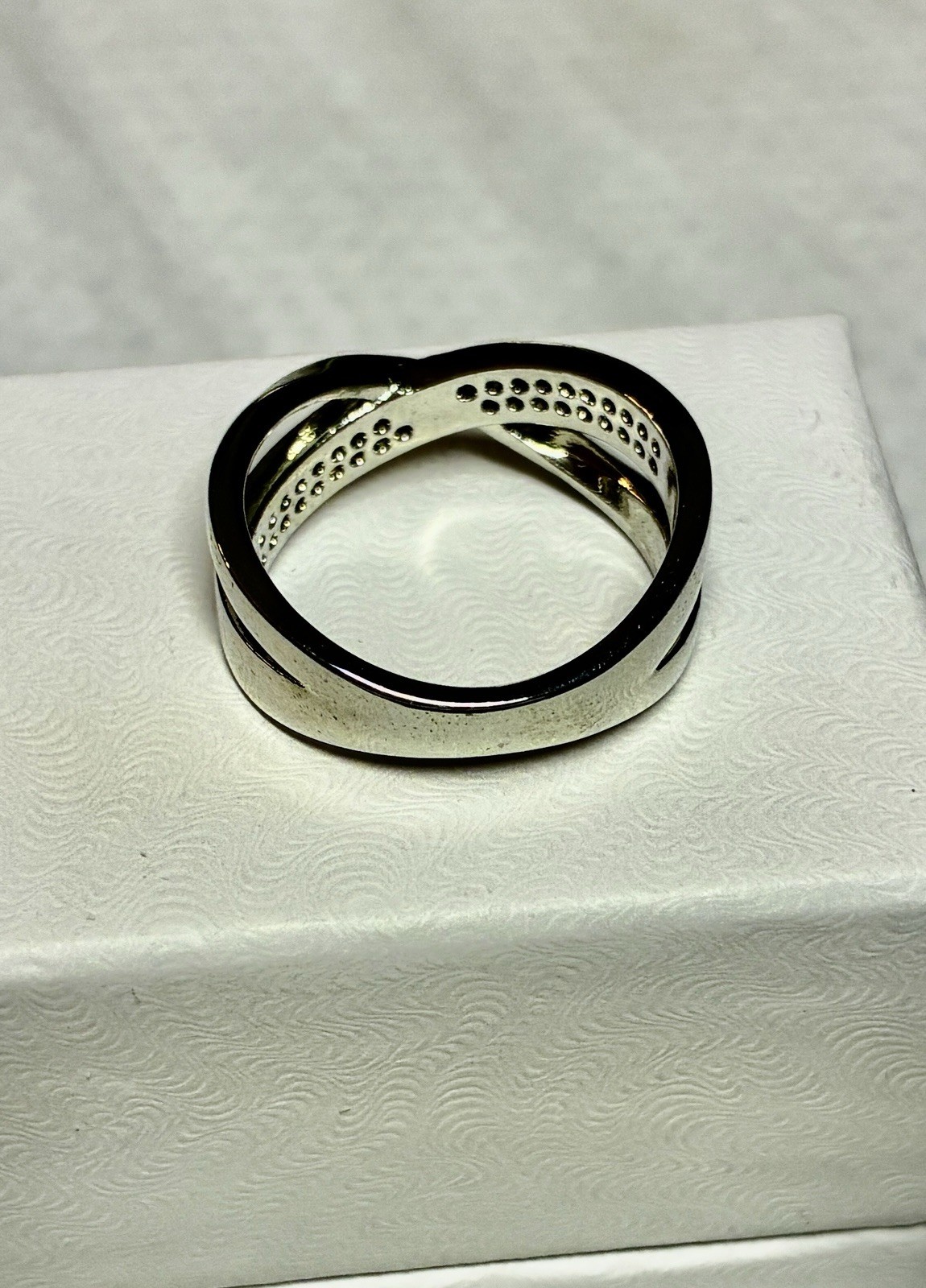 White Sapphire Cubic Zirconia in a 9.25 Sterling Silver Infinity Band Size 9.0