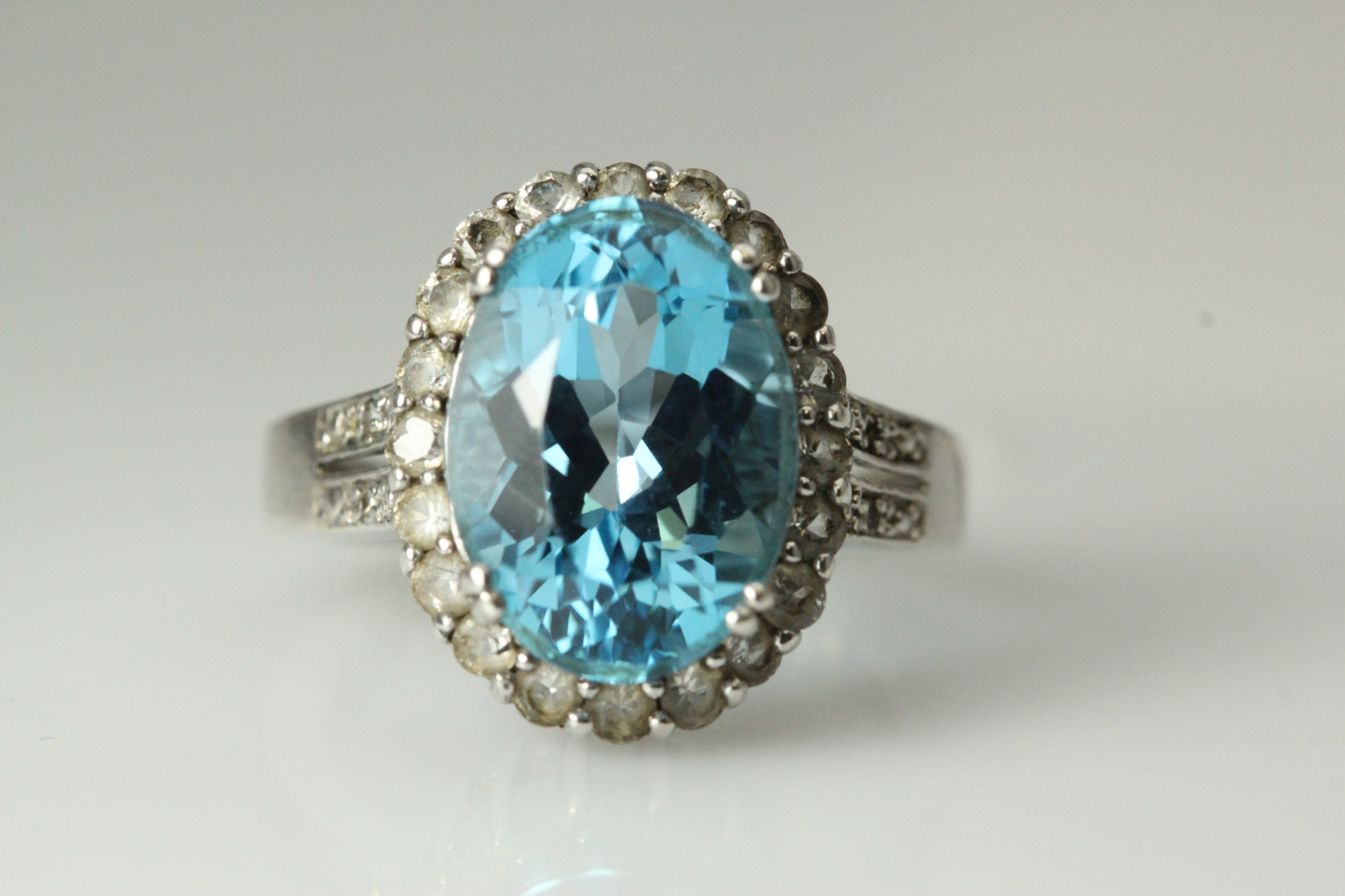 925 Sterling Silver Size 6.75 Oval Blue Stone in CZ Halo 5.1 Grams (RIN7209)