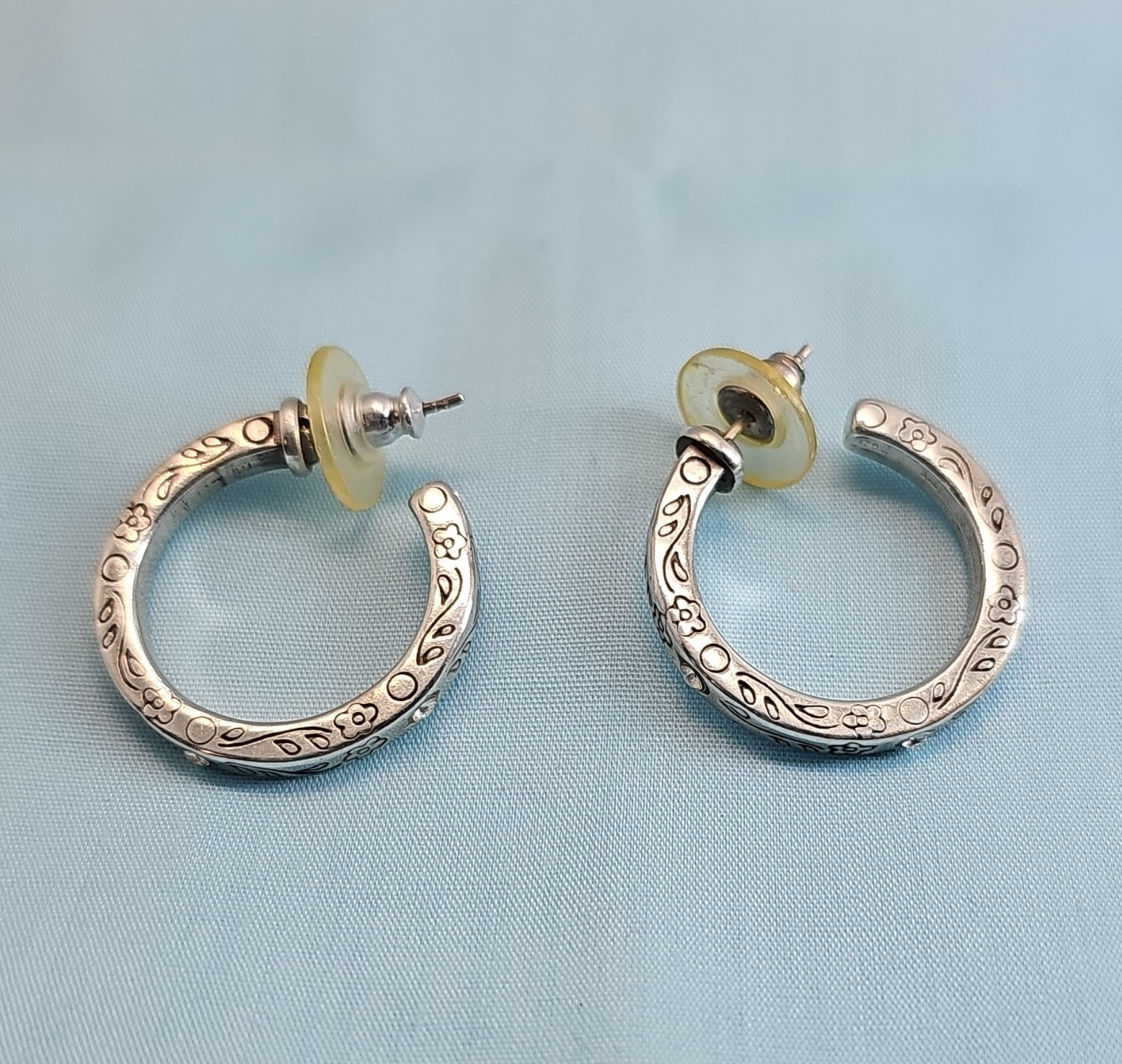 Brighton Silver Tone Floral Engraved Round Hoop Earrings