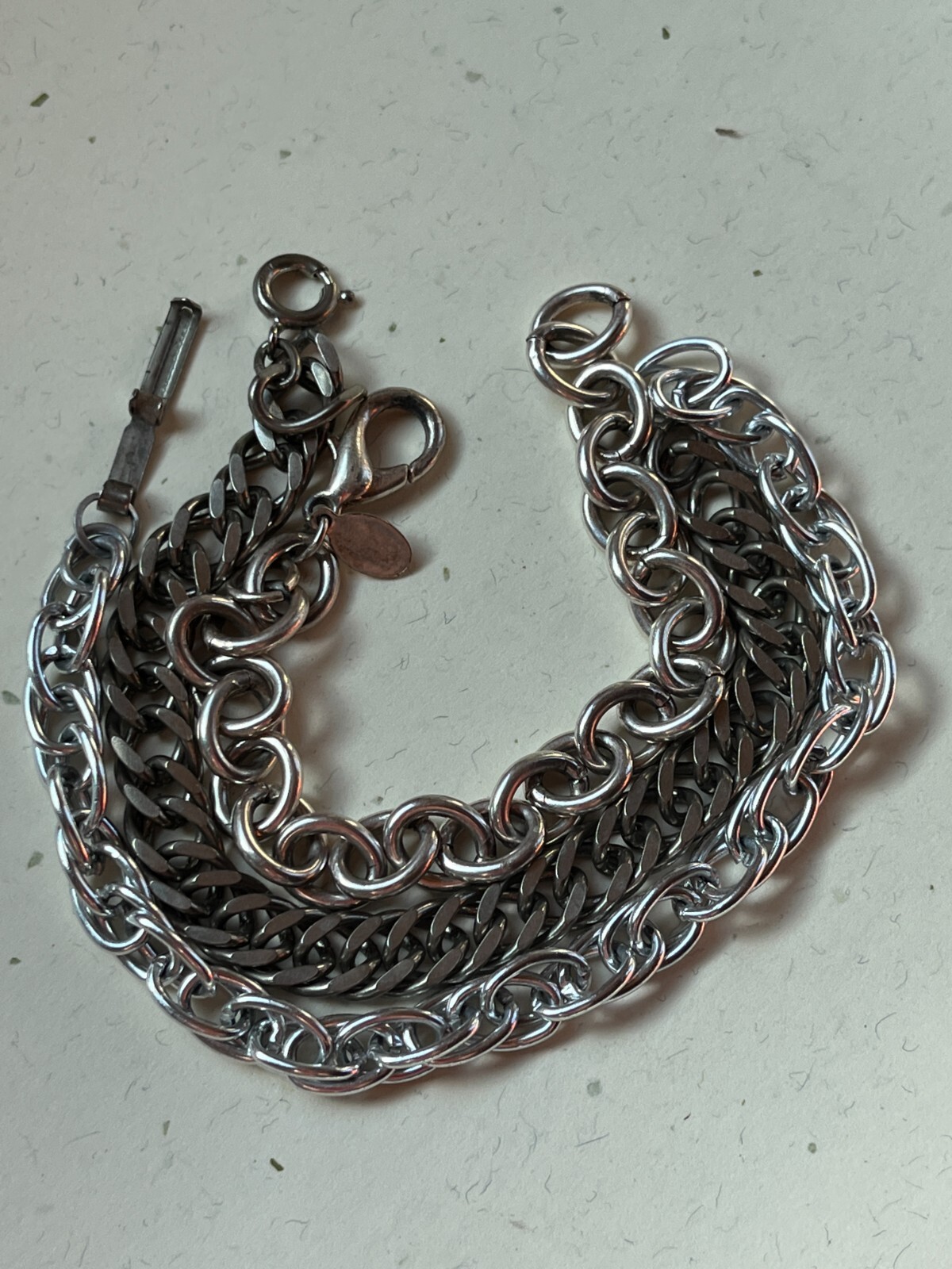 Lot of Silvertone Charm Bracelets – 6.5 to 7 inches in length x 0.25 inches to