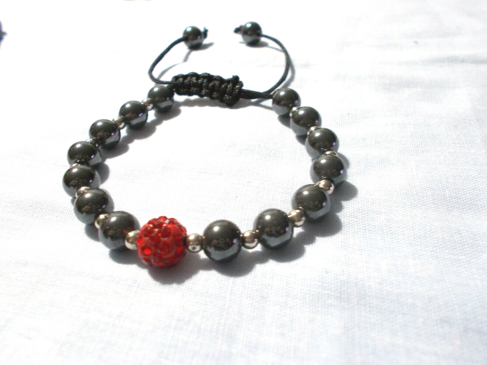 GRAY BLACK HEMATITE BEADS and RED CRYSTAL DISCO BALL ADJUSTABLE CORD BRACELET