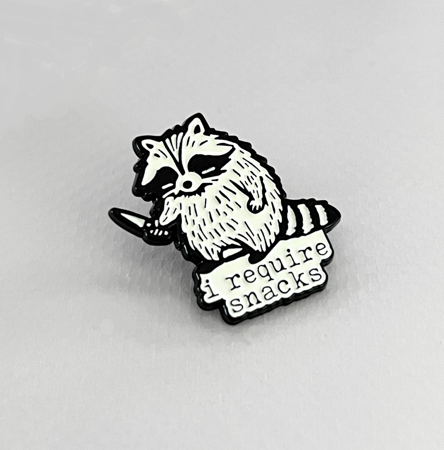 I Require Snacks Raccoon Enamel Pin – Funny Animal Meme Lapel Badge