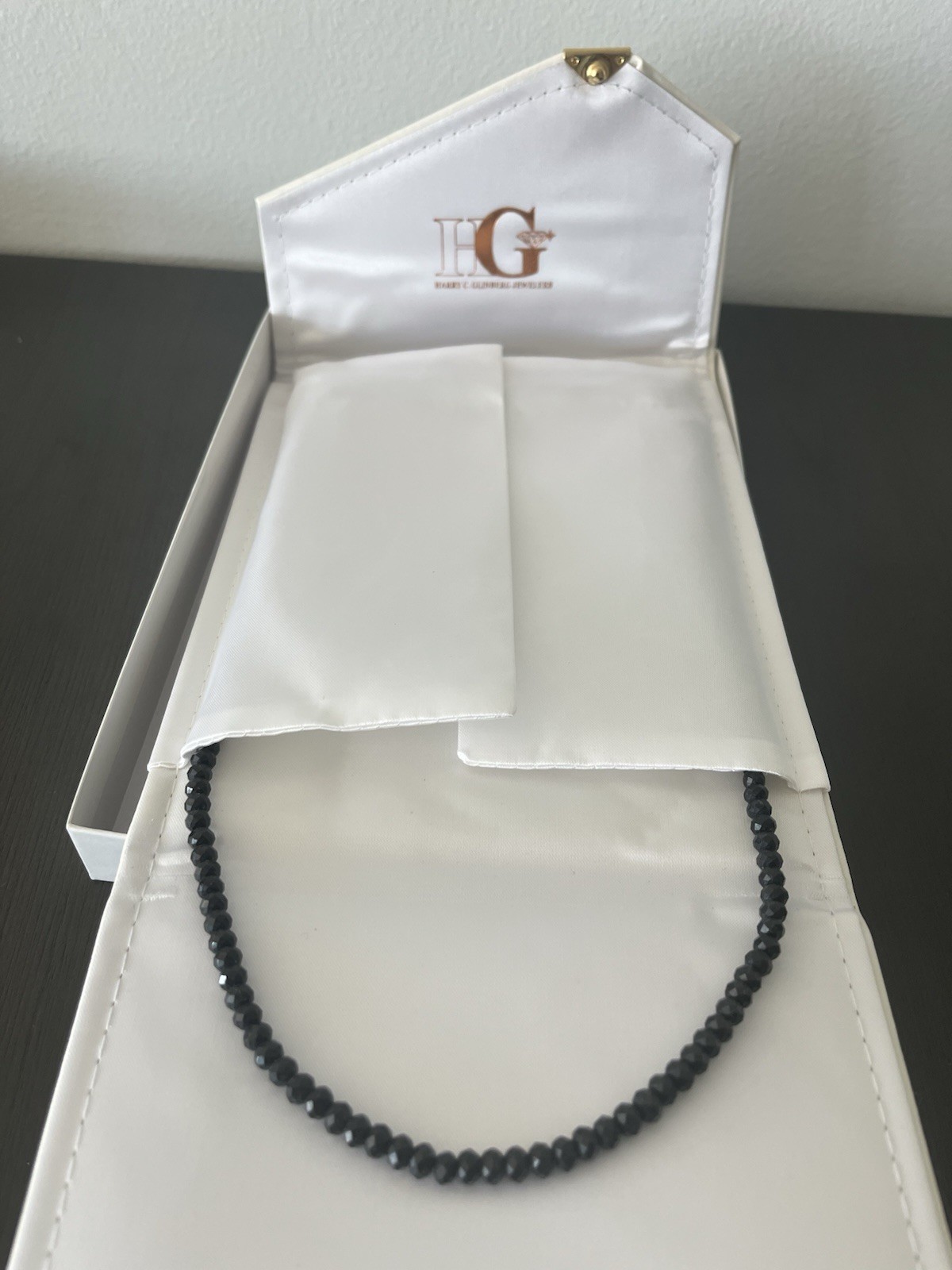 Black Spinel Faceted Bead Necklace Harry C. Glinberg Jewelers White Leather Box