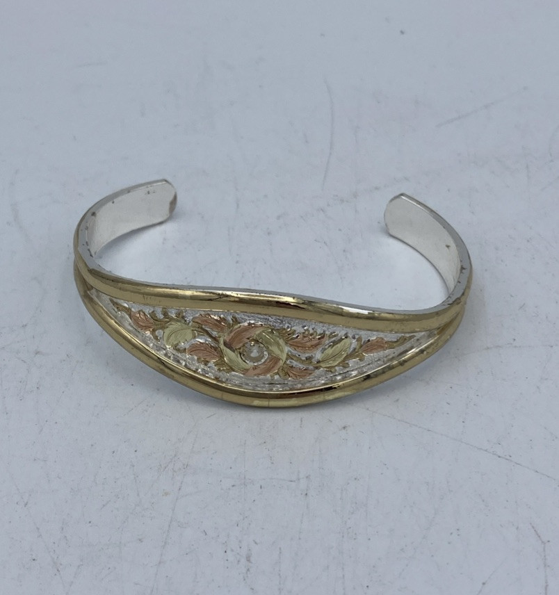 Silver Tone Gold And Copper Plated Highlights And A Very Small Diamond Ungraded