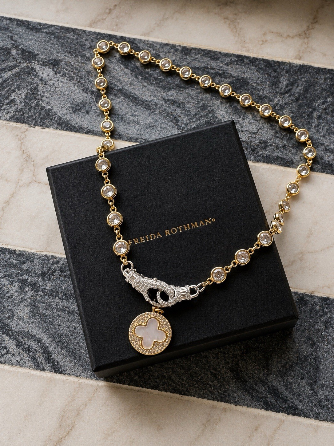 Freida Rothman Gold Tone Crystal Station Necklace with Clover Pendant – Gold