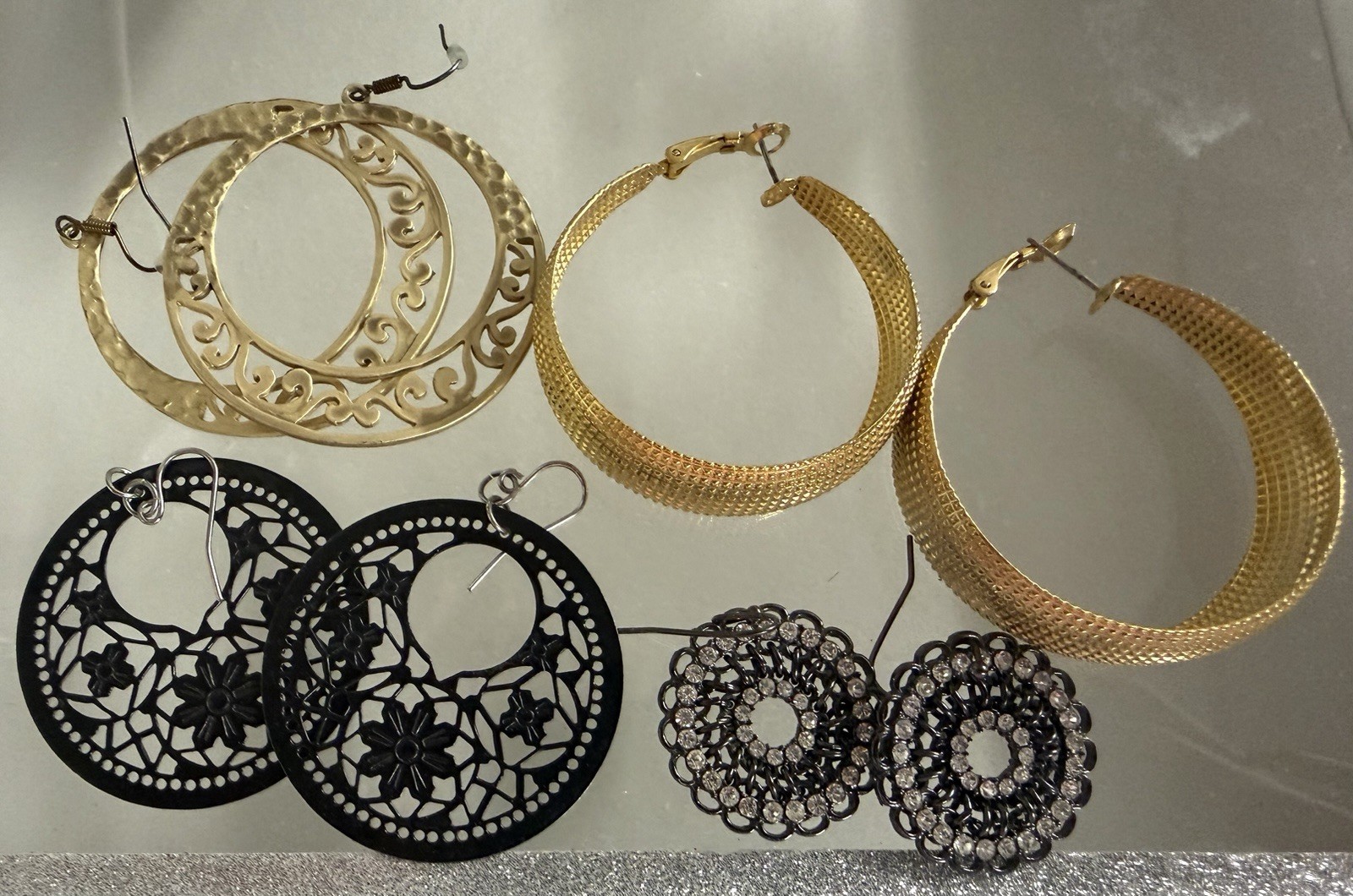 Lot Of 4 Pairs Of Pierced Hoop Earrings Gold Tone And Black