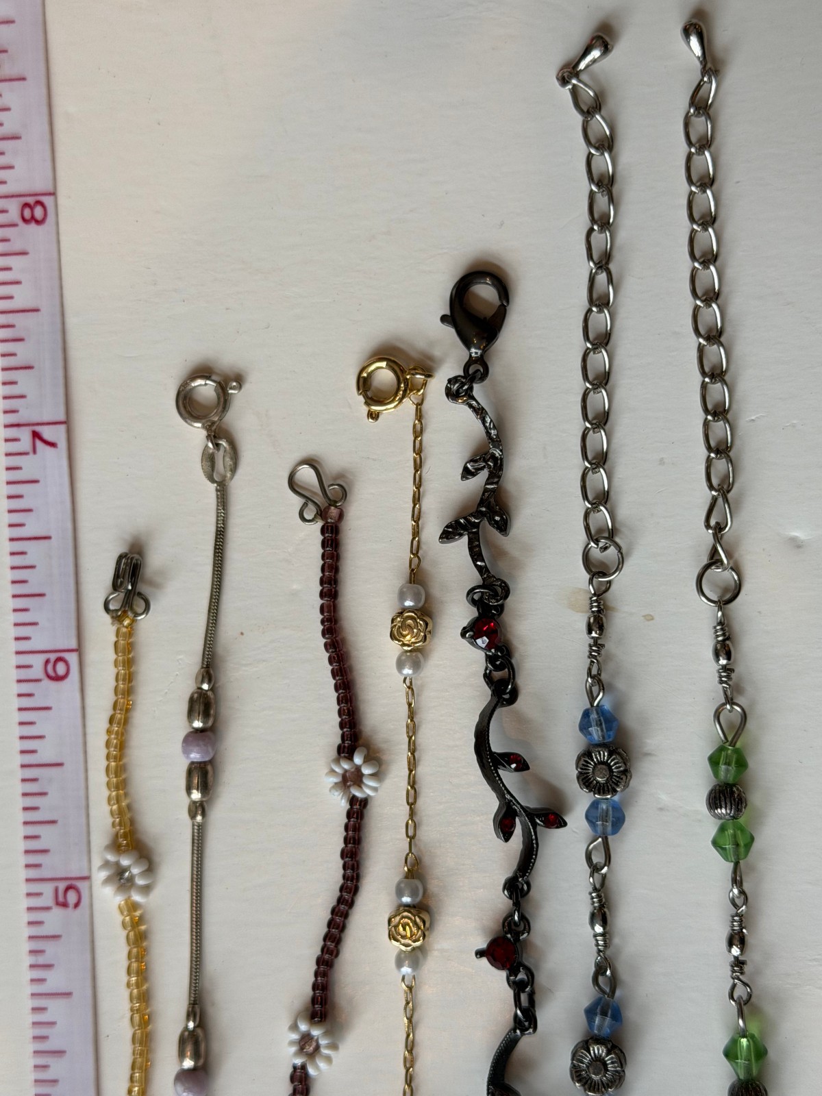 Lot of 7 Thin, Delicate Floral Bead Bracelets, from 6.5″ to 8.5″,