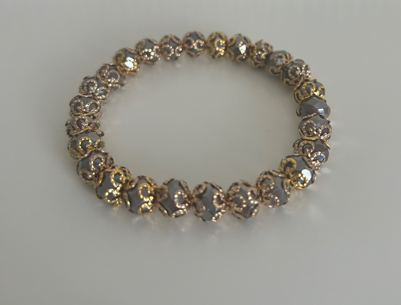 Ladies beautiful bracelet, with beige Austrian Crystal beads and copper detail
