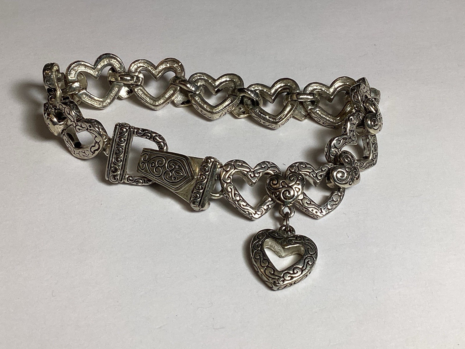 7 3/4” FANCY HEARTS BRACELET WITH DANGLE HEART FOLD OVER MAGNETIC CLASP