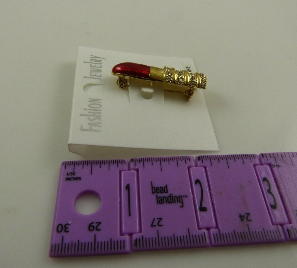 red lipstick pin bling crystals lead safe reds and gold avon mary kay reps