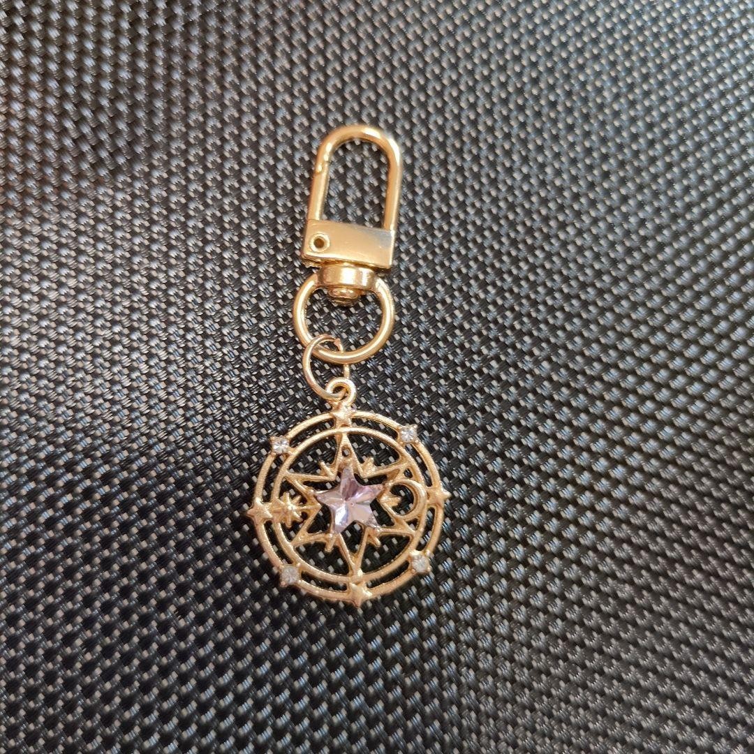 Star-shaped Gold Keychain with Purple Stone Crystal Decoration 6cm Used