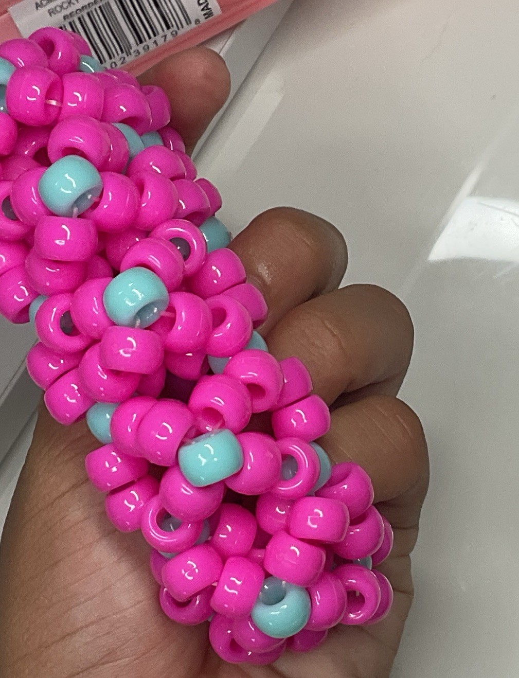 handmade pink w/ cyan accents 3d X’s kandi cuff 😋😋😋 has SUPER stretchy string