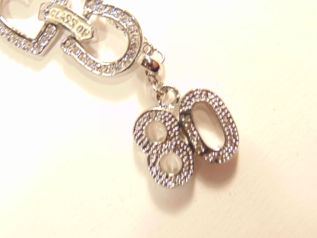 pre-owned silver colored necklace with white crystals “Class of 08”