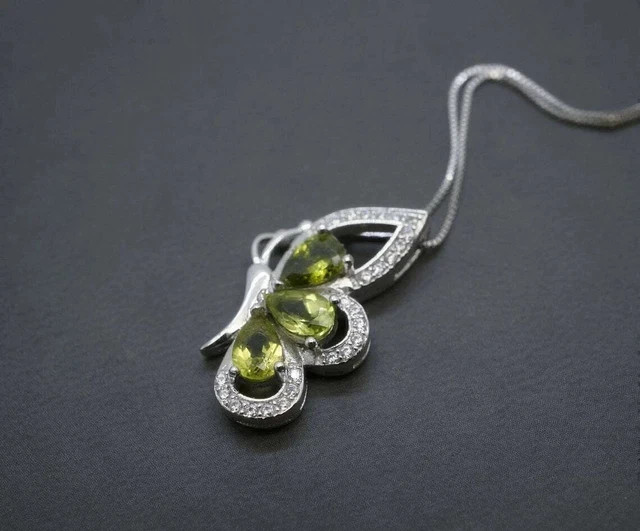 2Ct Pear Cut Simulated Peridot Women’s Butterfly Pendant 14K White Gold Plated