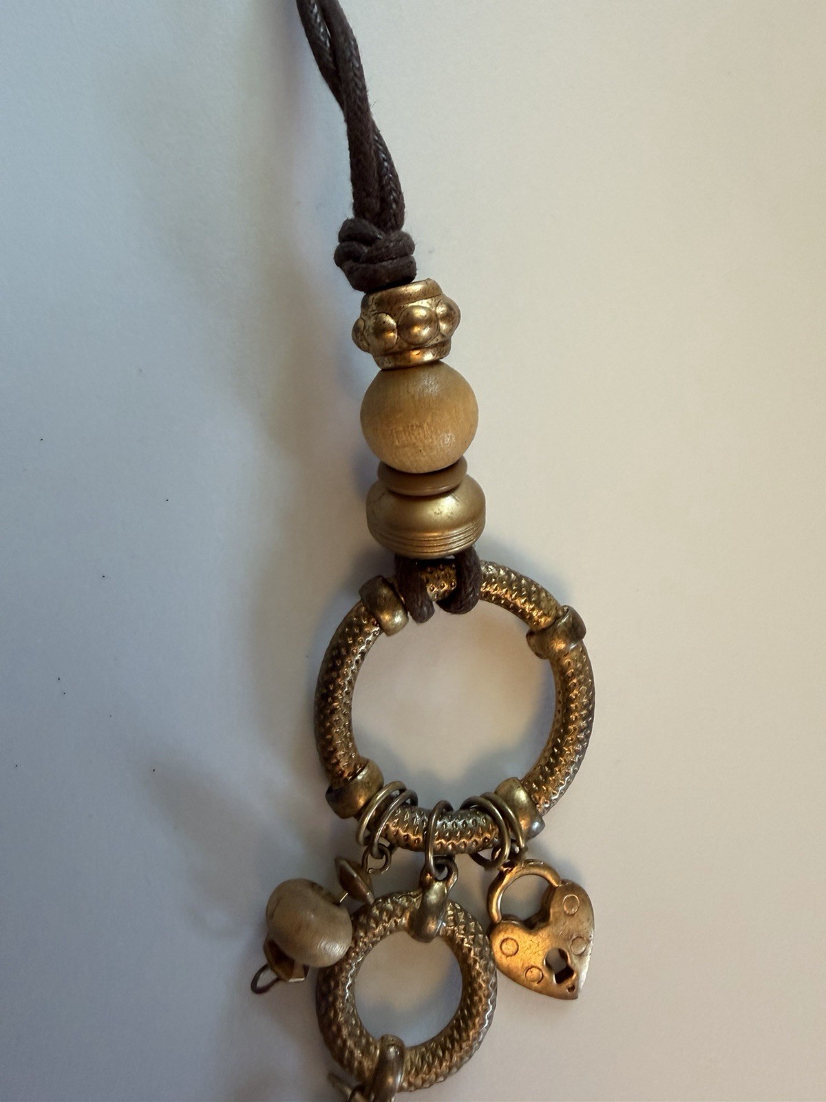 Brown Cord Necklace 20in Adjustable Gold Tone Heart Lock Charm Beads Rings