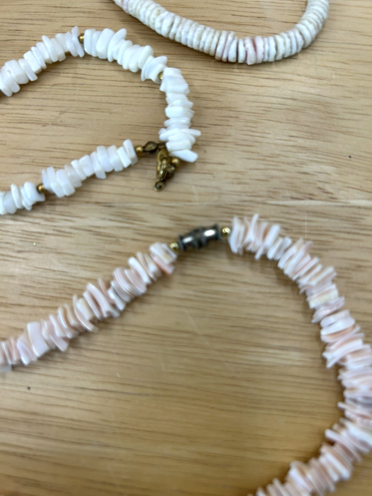 Three Vintage 2 Pale Pink, 1 White Puka/Hawaiian necklaces, 2-16 in, 1-18 in