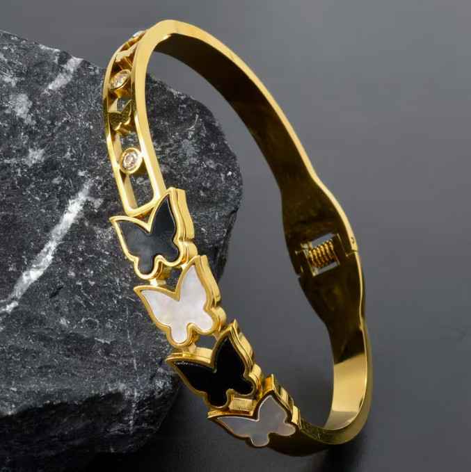 Exquisite Geometric Black and White Butterfly-Accented Stainless Steel Bracelet