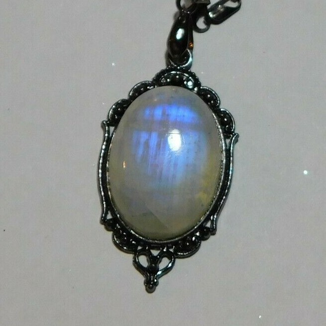 Blue Innerglow, Rainbow Moonstone Gemstone in Gun metal black setting and chain