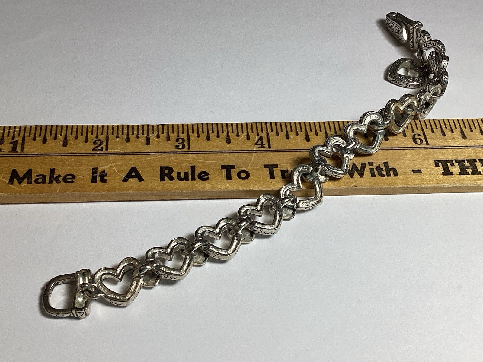 7 3/4” FANCY HEARTS BRACELET WITH DANGLE HEART FOLD OVER MAGNETIC CLASP