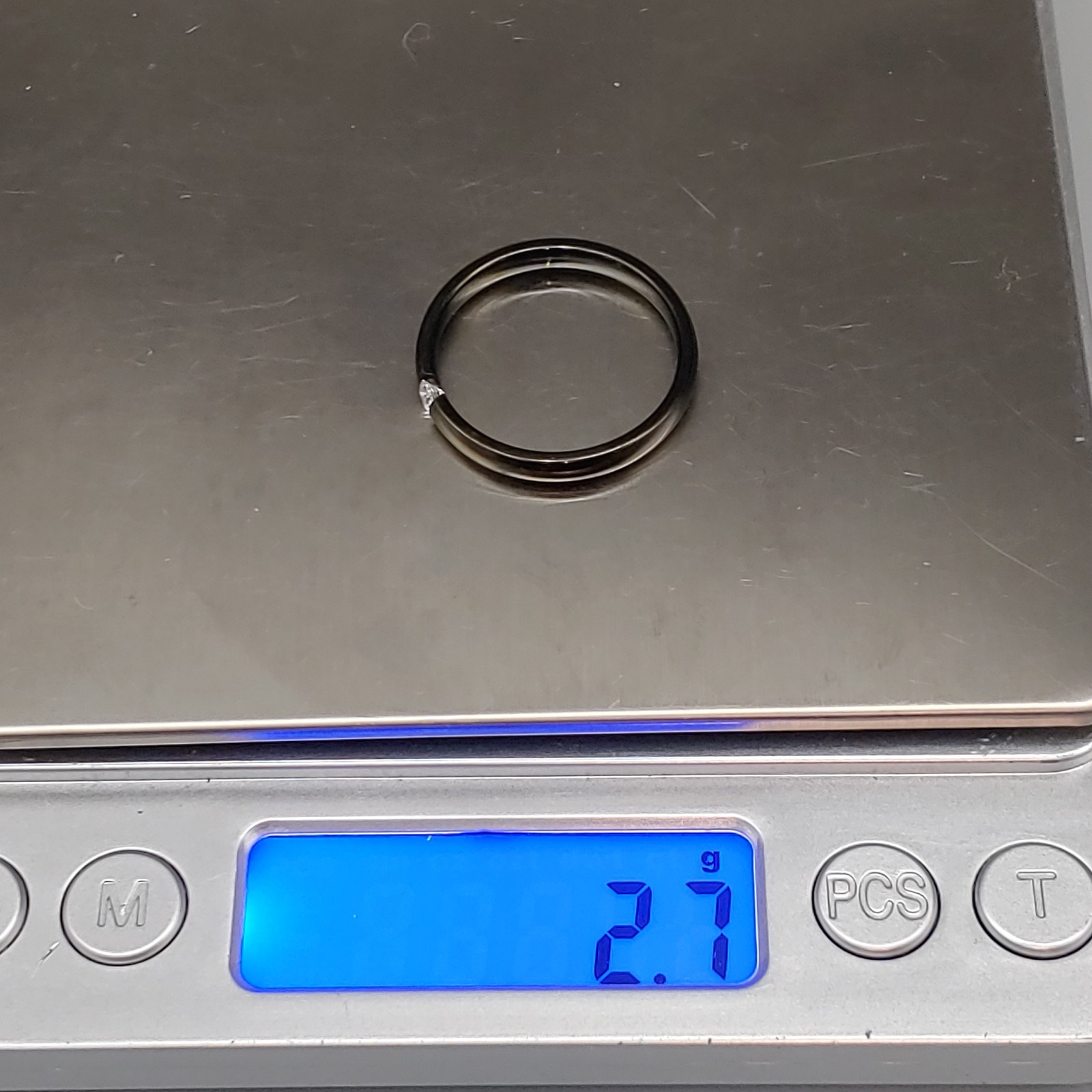 Round Cut Tension Set Style Black tone ring size 11 weighs 2.7g band 3mm