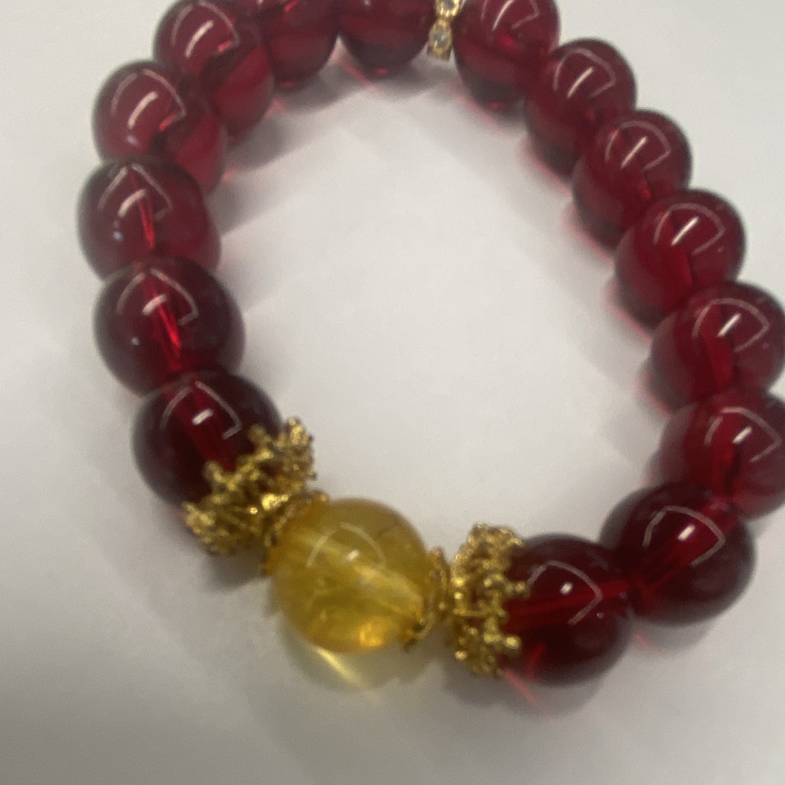 Red Beaded Stretch Bracelet w/ Yellow Center Bead, Gold Tone Spacers