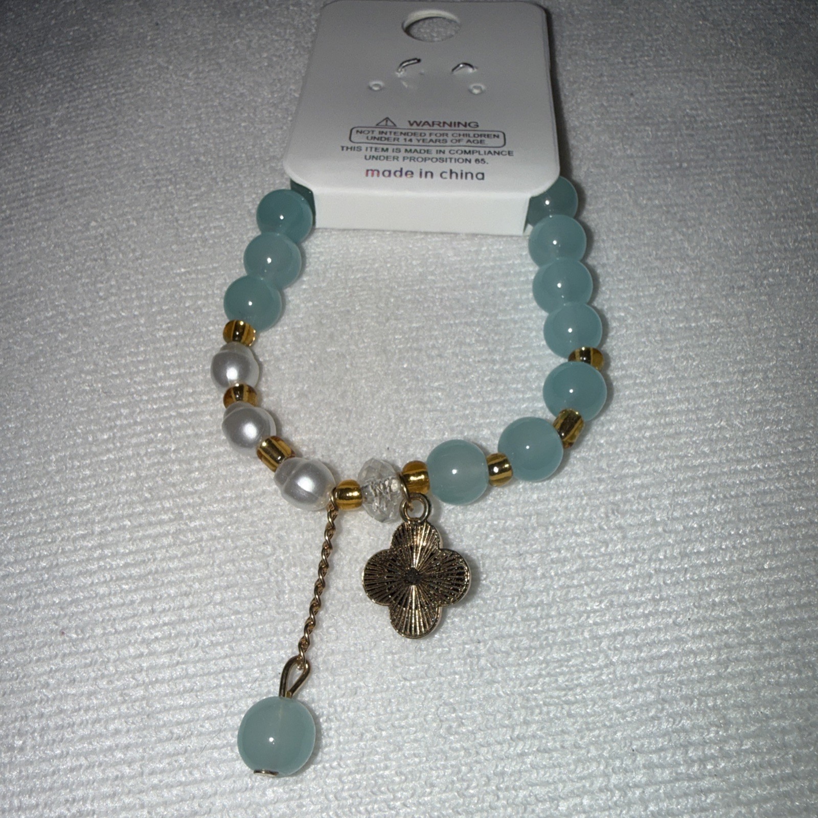 Light Green & white Expandable Bracelet With Dangle Ball And Clover