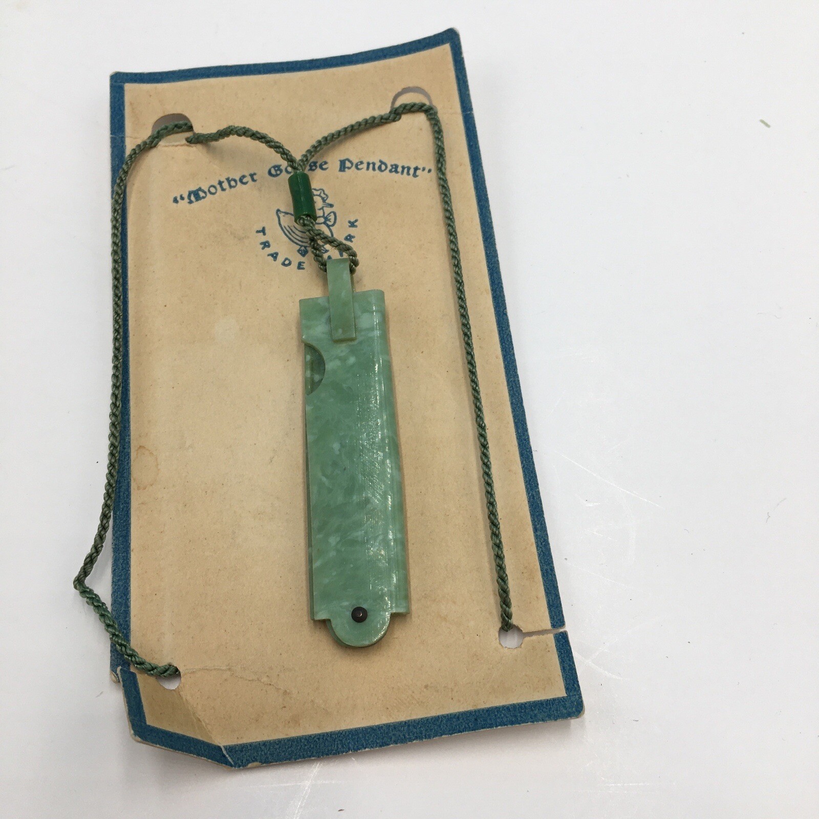 Vintage Easter Bunny green celluoid fold out Comb Childs Mother Goose Pendant