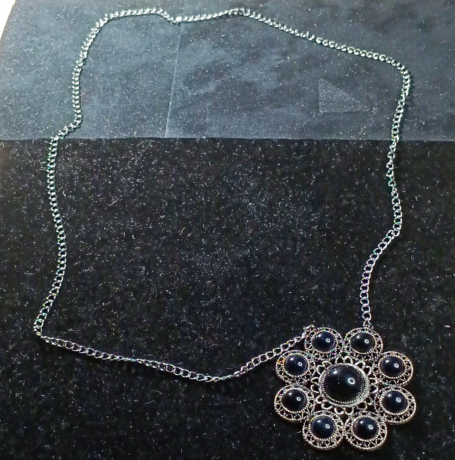 Black & Silver-Tone Pendant On A 24″ Stainless Steel Chain With No Clasp