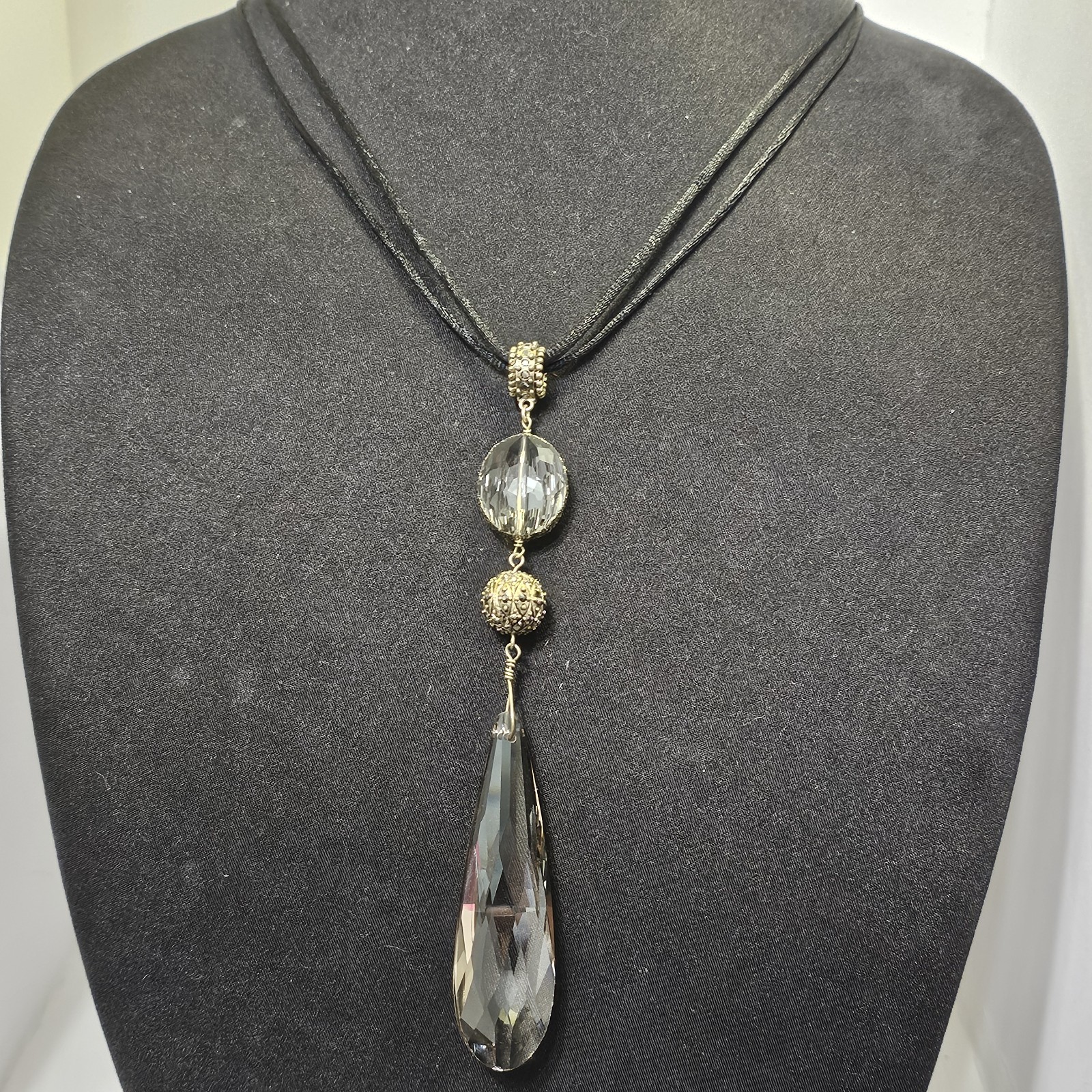 Chicos Smoky Gray Crystal Teardrop Pendant Black Cord Multi Strand Necklace Gold