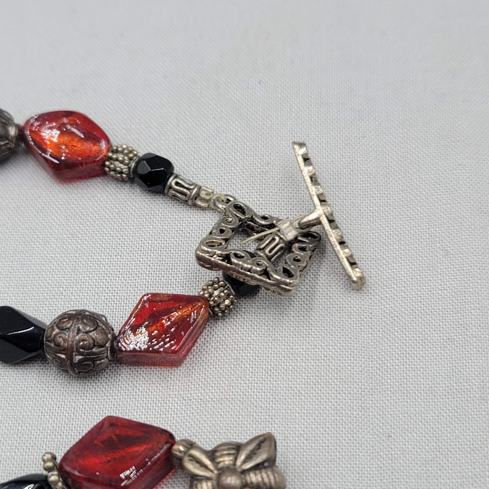Red and Black Glass Bead Necklace Silver tone Heart Pendant Toggle 18″