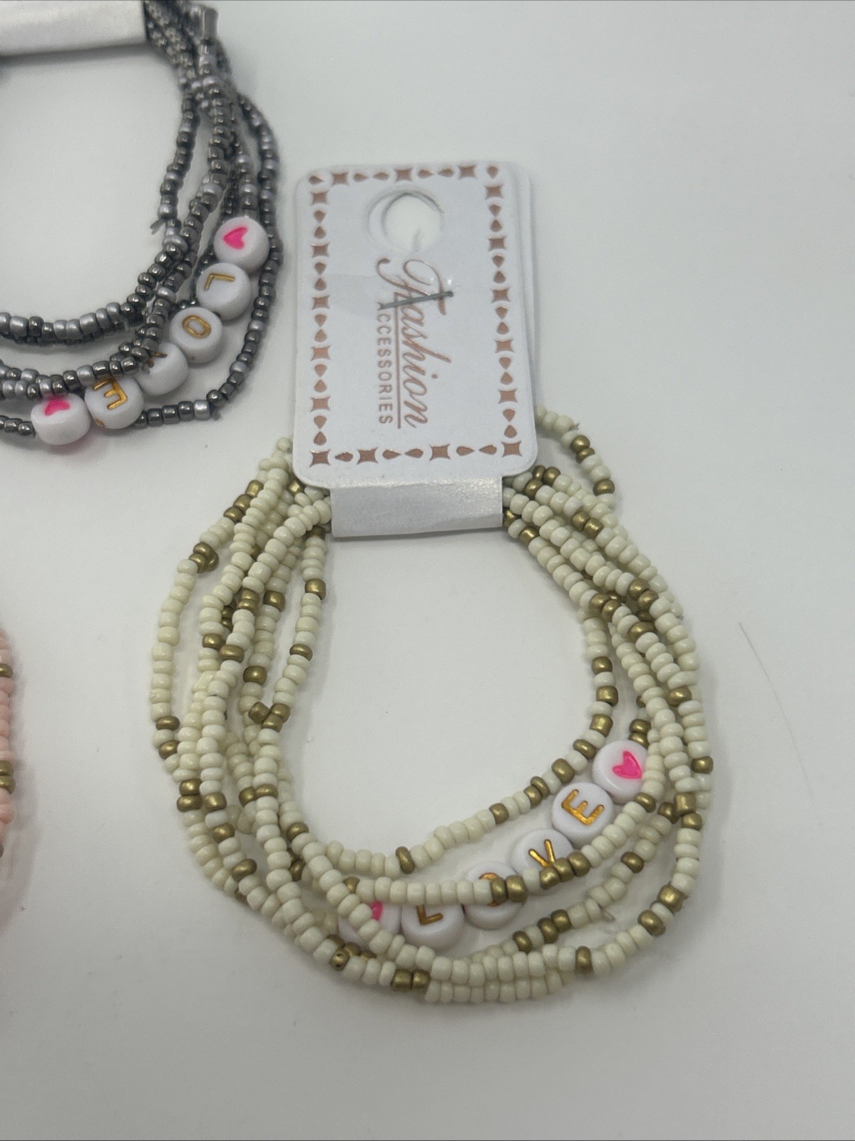 4 NWT Fashion Accessories Stacked Elastic Bead LOVE Bracelets Pink Cream Silver