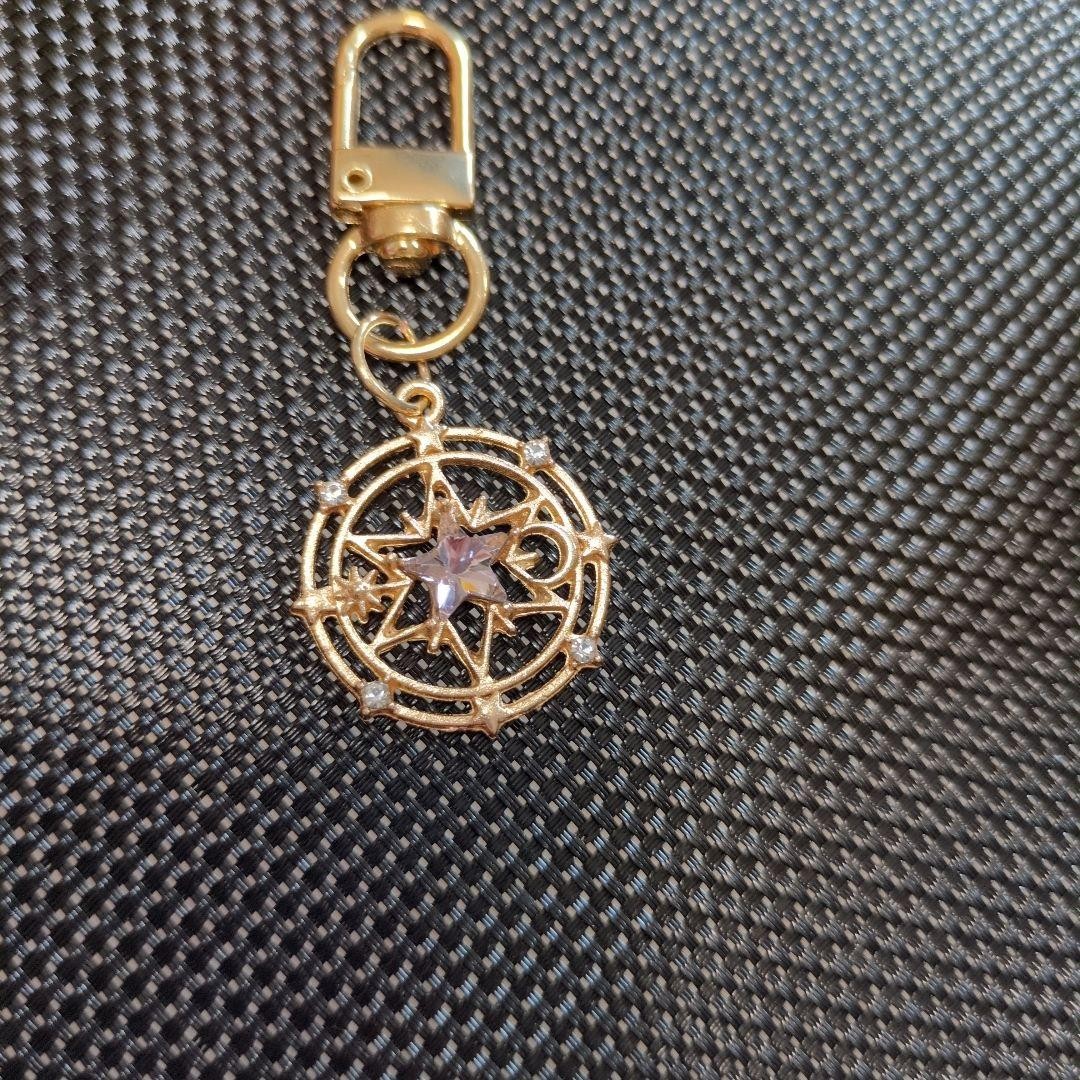 Star-shaped Gold Keychain with Purple Stone Crystal Decoration 6cm Used