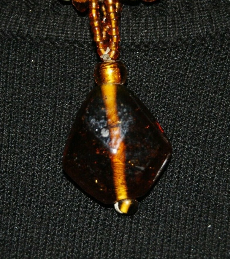 MULTI STRAND AMBER COLOR GLASS WITH LARGE GRIPOIX PENDANT STATEMENT NECKLACE