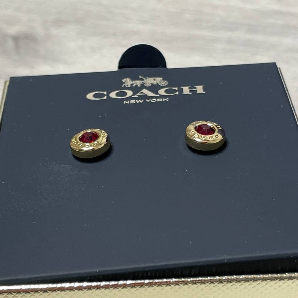Coach Open Circle Red Stone Strand Earrings Boxed Red/ Gold tone