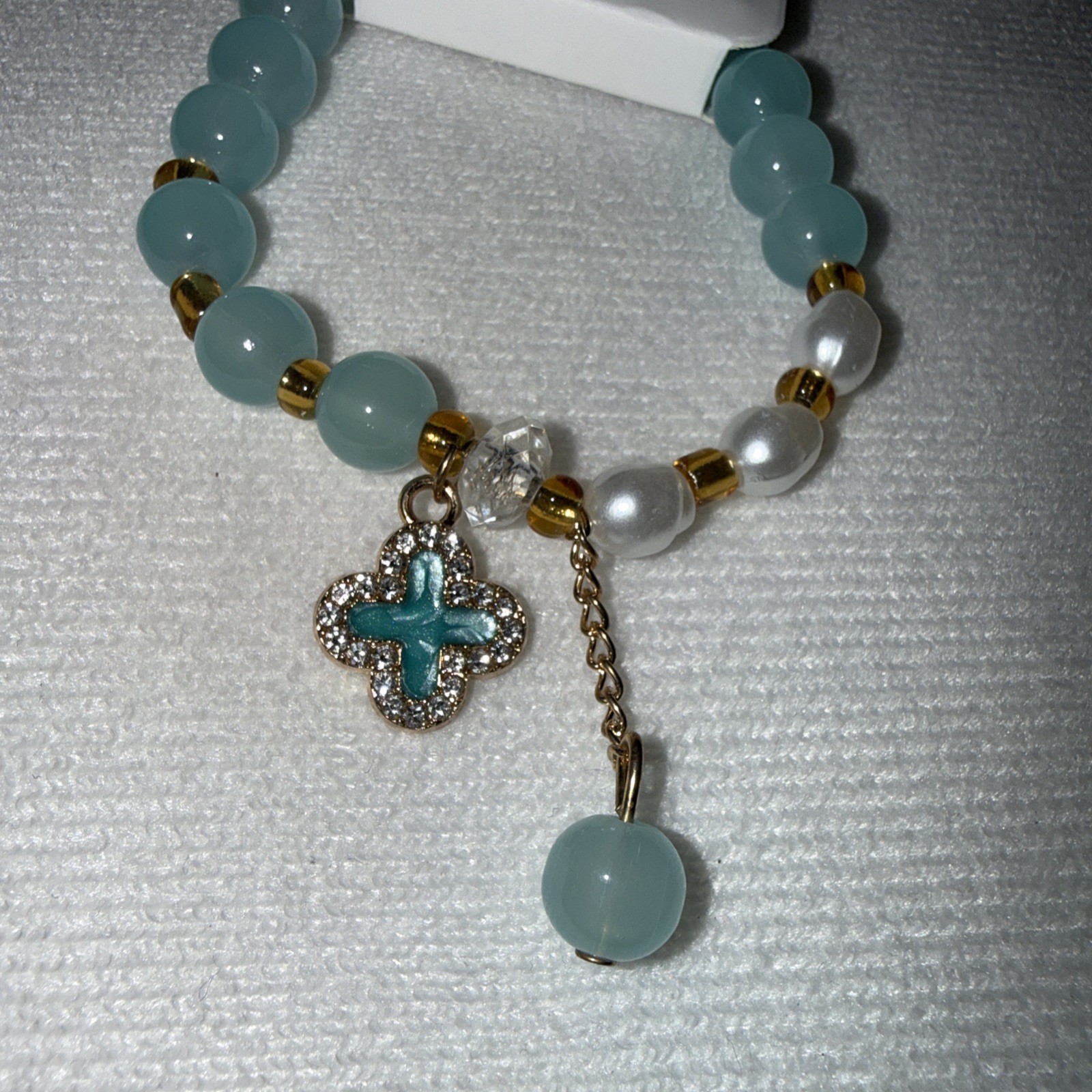 Light Green & white Expandable Bracelet With Dangle Ball And Clover