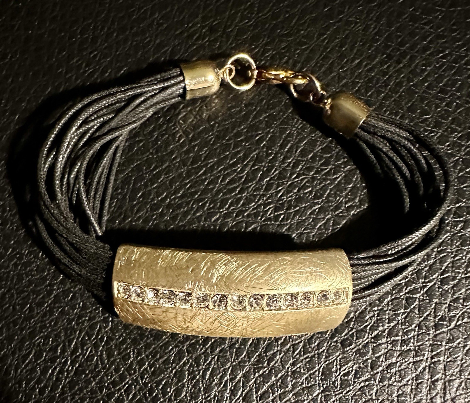 multi-strand black cord bracelet