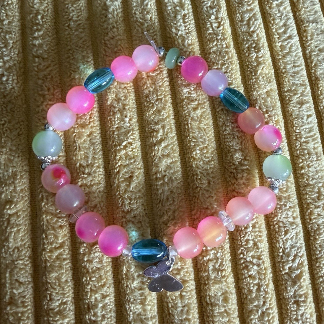Multicolor Glass Beaded Stretch Slip-On Bracelet with butterfly Charm