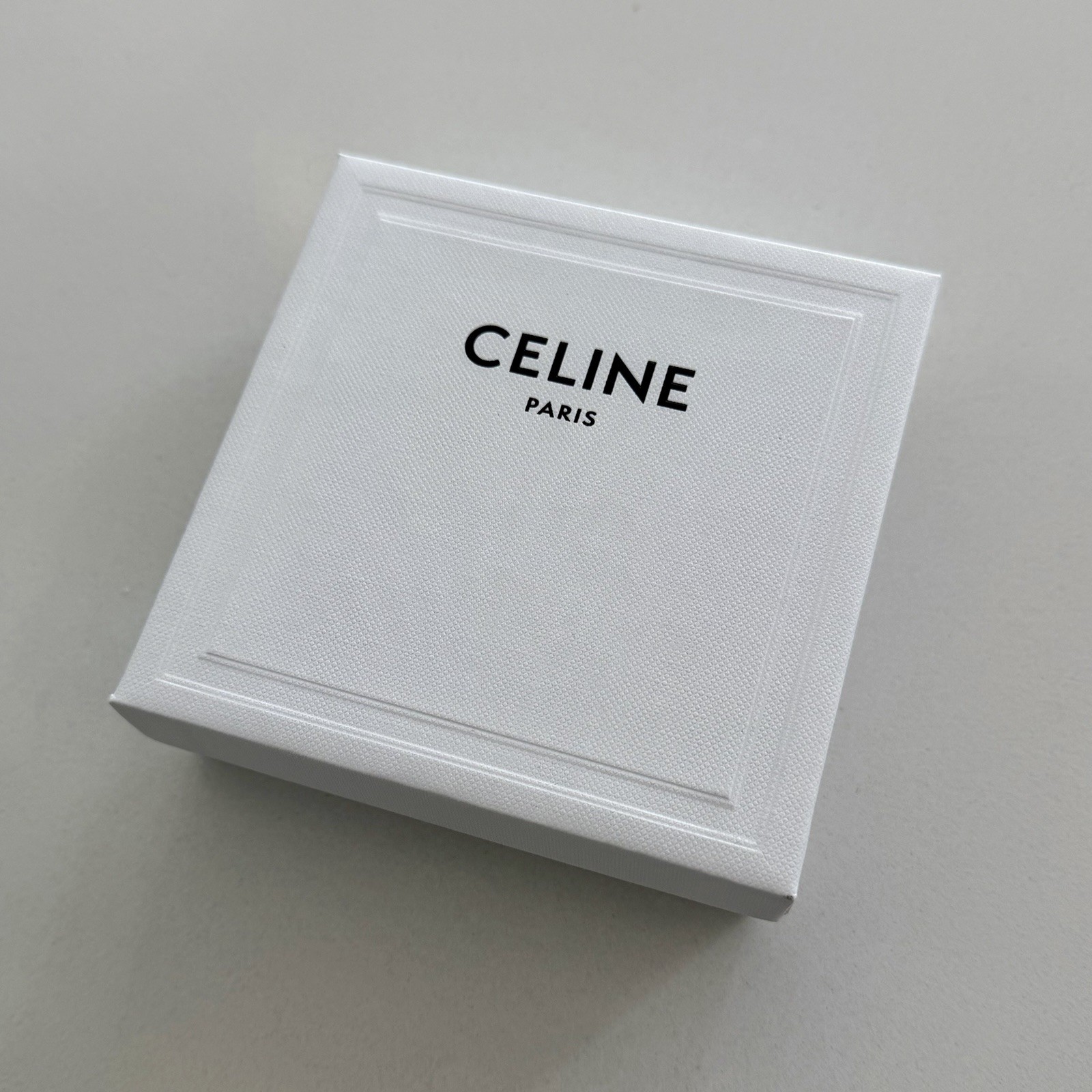 CELINE CHARM TRIOMPHE KEY IN BRASS WITH RHODIUM FINISH
