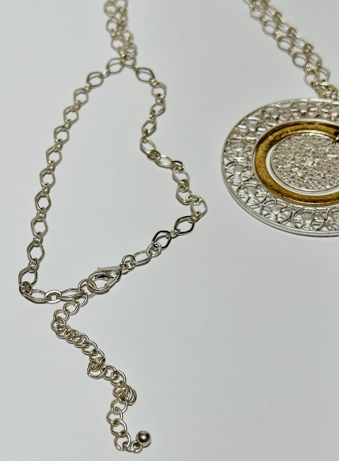 Silver Tone Necklace With 3 Circle Textured Pendants Gold And Silver Tone 31in.