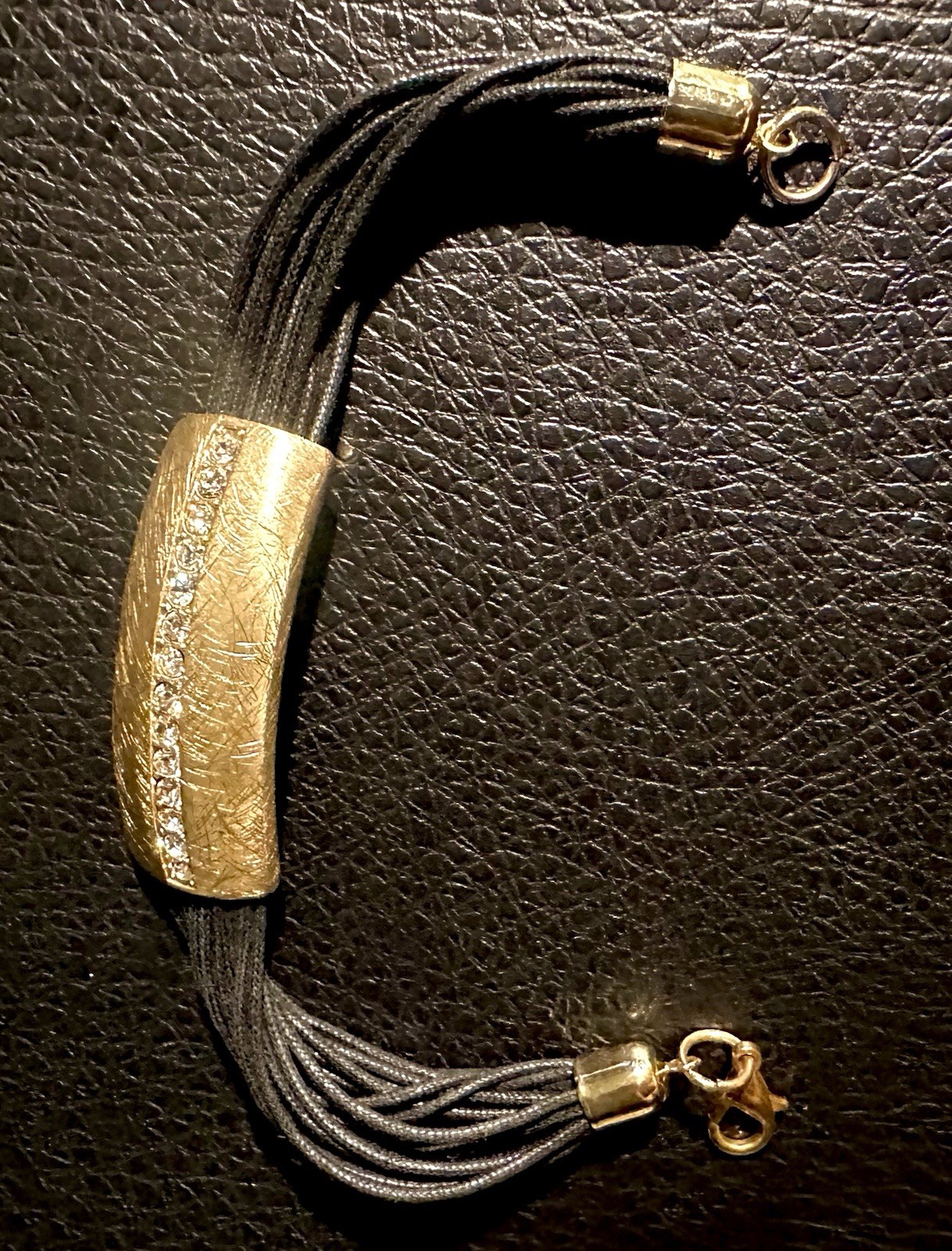 multi-strand black cord bracelet