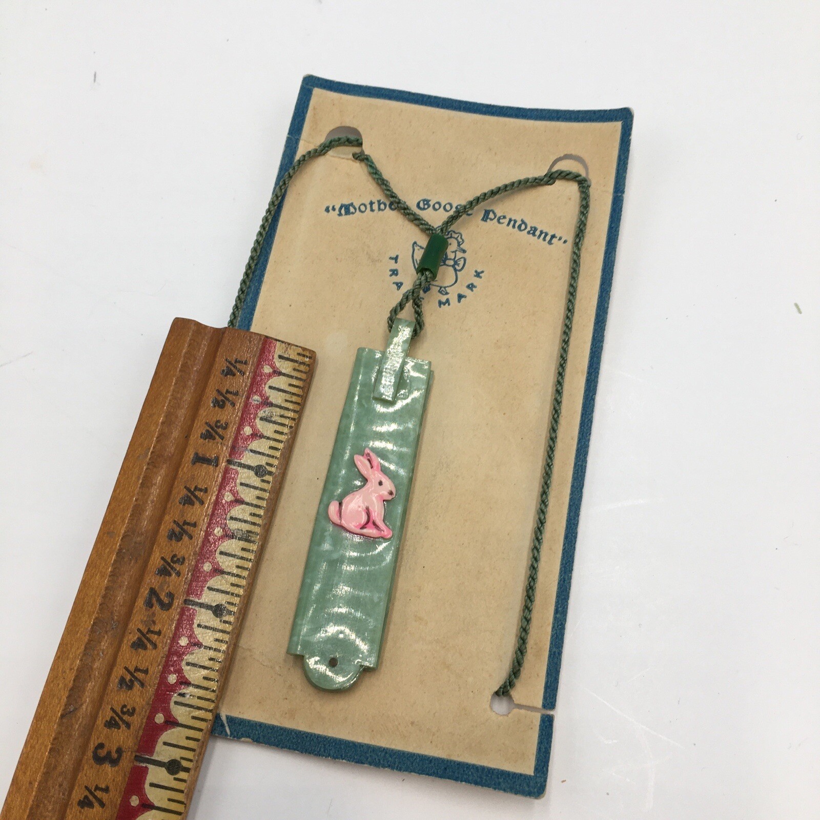 Vintage Easter Bunny green celluoid fold out Comb Childs Mother Goose Pendant