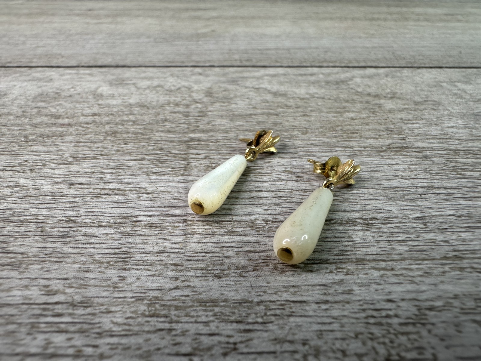 Elegant Gold Tone Drop Earrings with Off-White Teardrop Cabochon Style Stones